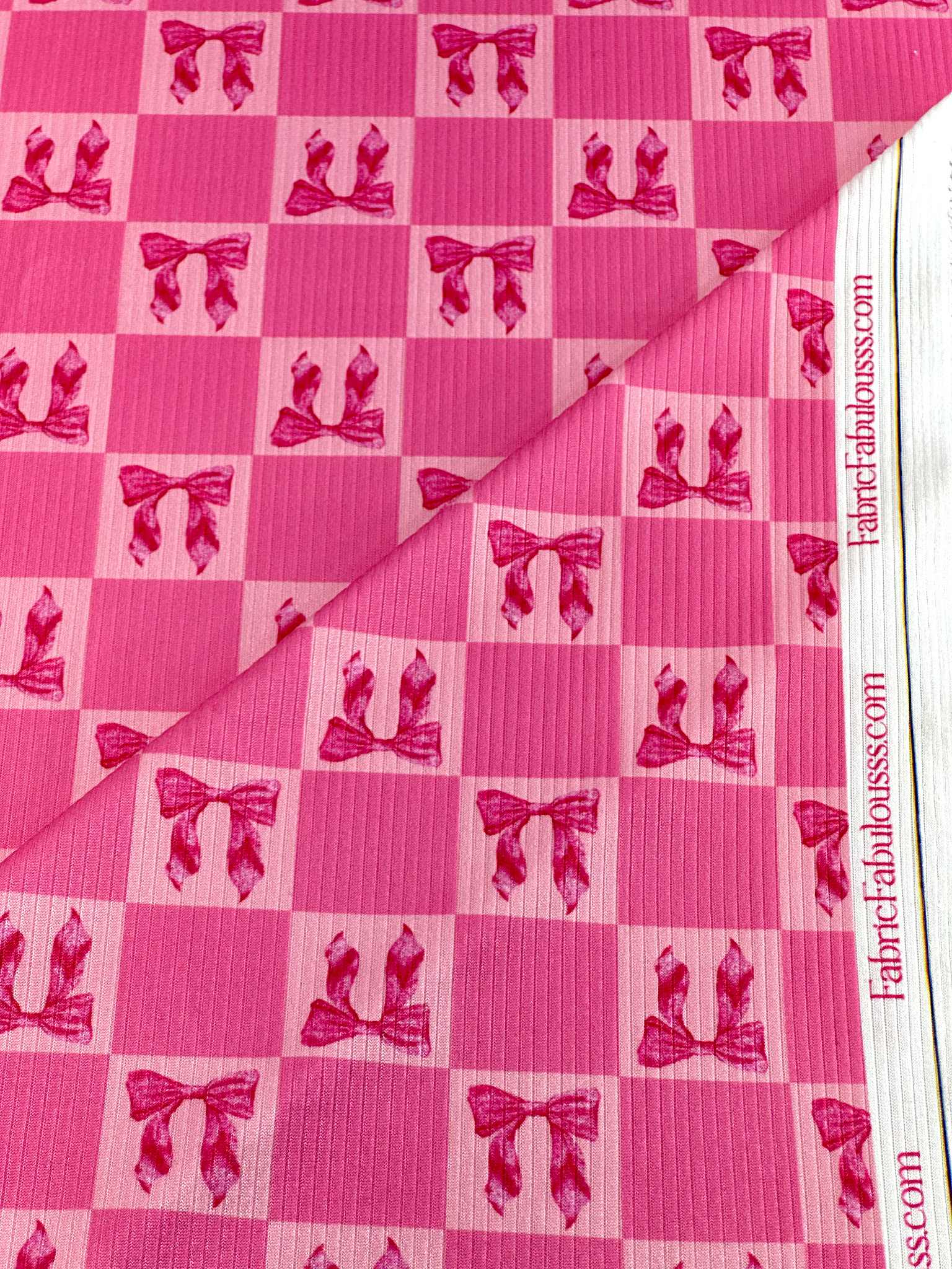 (4X2 RIB) HOT PINK BOWS ON PINK MEDIUM CHECKERED