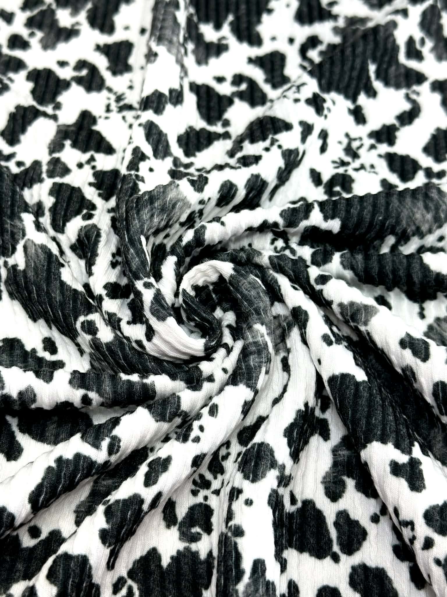 (URBAN RIB) SMALL BLACK COW FUR PRINT ON OFF WHITE