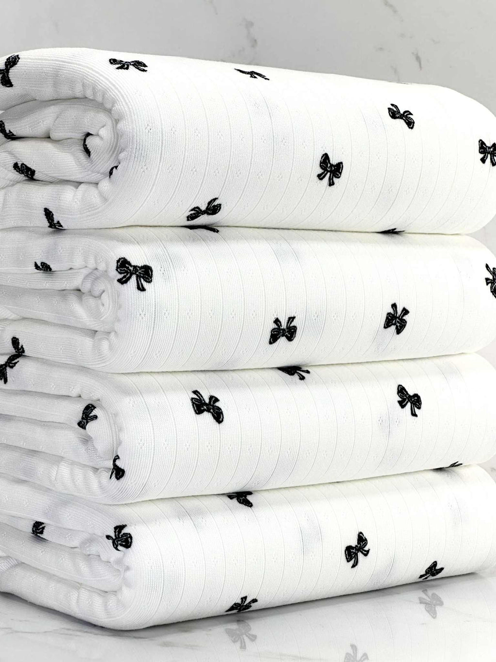 (POINTELLE RIB) BLACK BOWS ON OFF WHITE