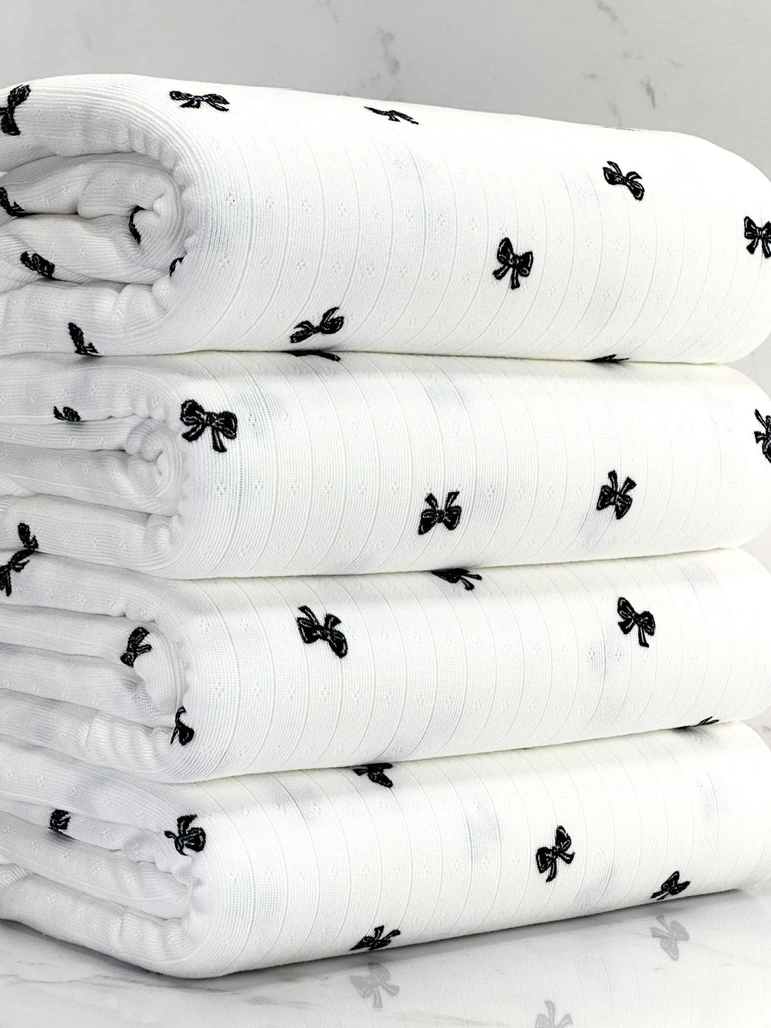 (POINTELLE RIB) BLACK BOWS ON OFF WHITE