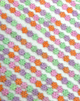 (TRIM) EMBROIDERED PINK, PURPLE, MINT, AND ORANGE TINY FLOWERS