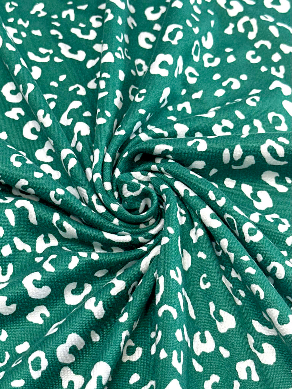 (DBP) TINY WHITE LEOPARD ON HUNTER GREEN