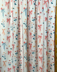 (SWIM) FLOWERS AND BOWS PATTERN ON CREAM