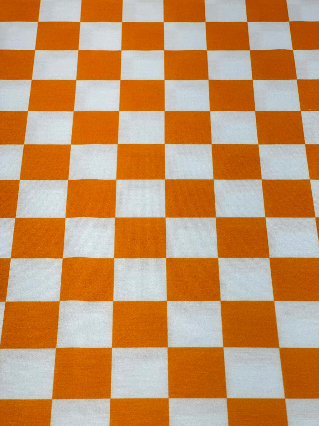 (FRENCH TERRY) ORANGE AND OFF WHITE CHECKERED