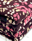 (HACCI SWEATER KNIT) PINK, IVORY, AND BLACK LEOPARD ON BURGUNDY