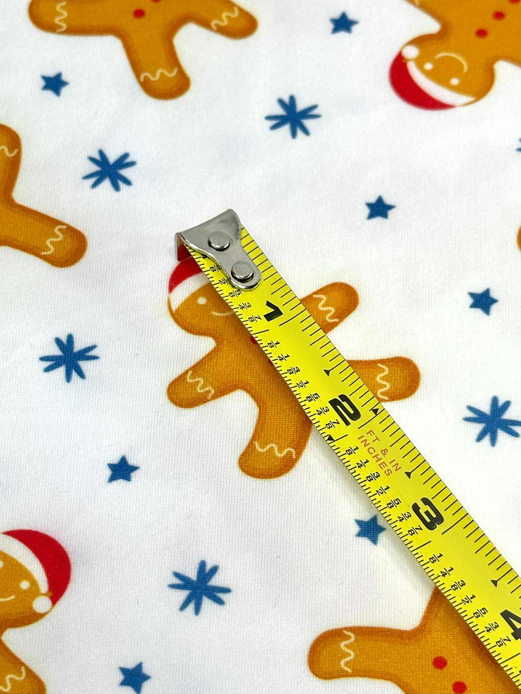 (DBP) MEDIUM GINGERBREAD MAN AND STARS ON OFF WHITE