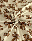 (DBP) FOOTBALL BOWS ON TAN