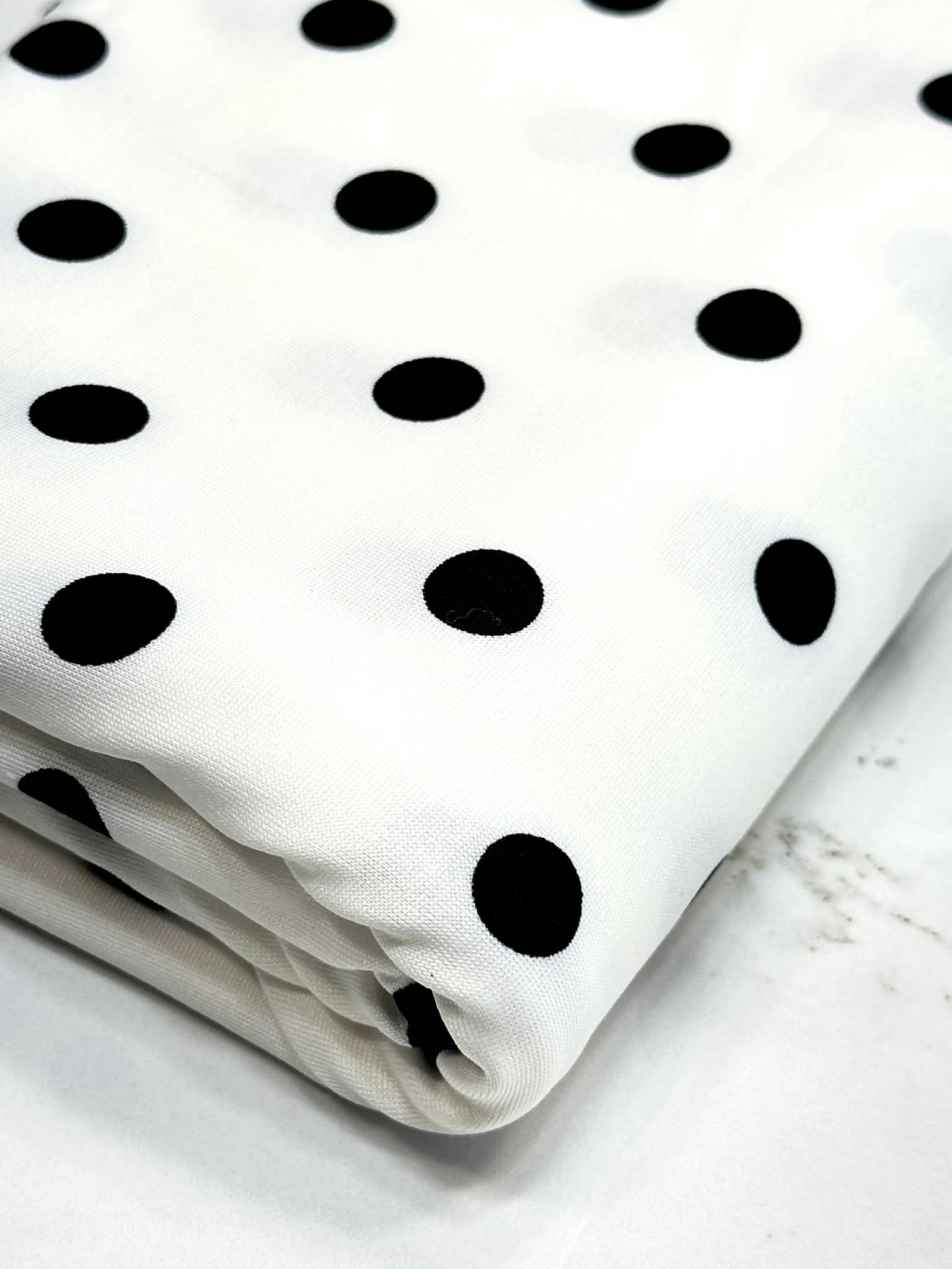 (ITY) BLACK POLKA DOTS ON OFF WHITE