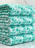 (POINTELLE RIB) TURQUOISE AND OFF WHITE TINY FLOWERS ON AQUA(2)