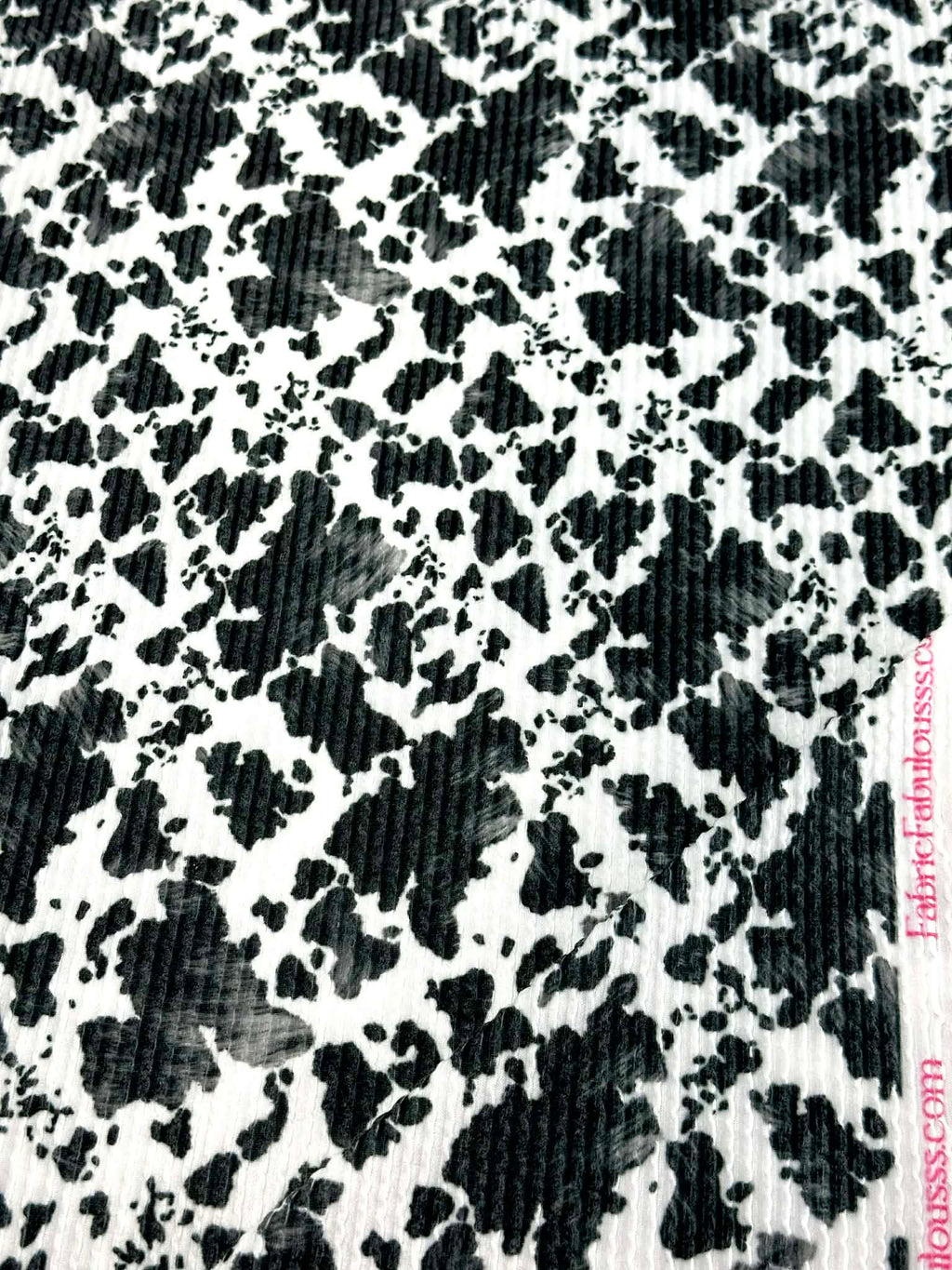 (URBAN RIB) SMALL BLACK COW FUR PRINT ON OFF WHITE