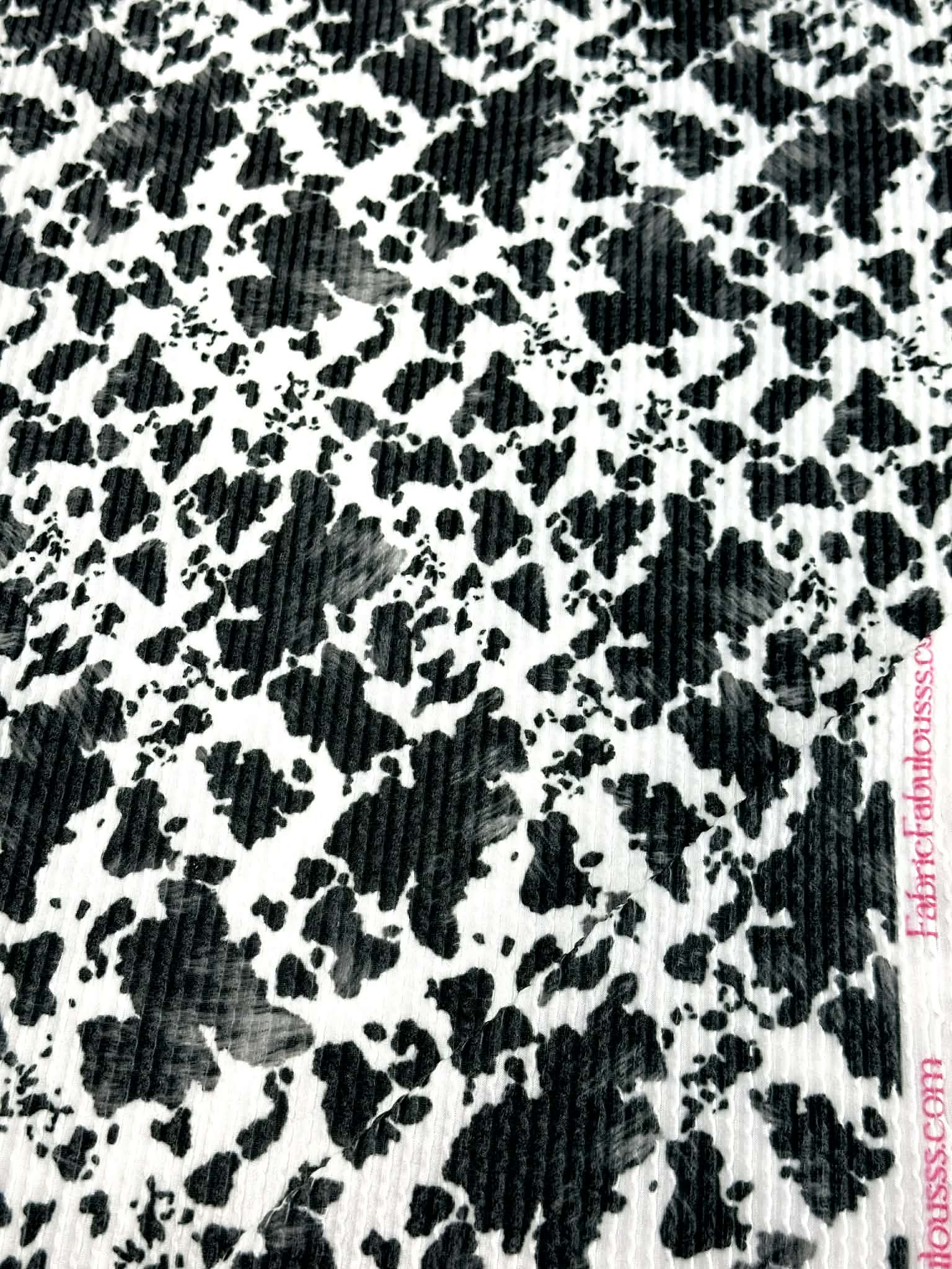 (URBAN RIB) SMALL BLACK COW FUR PRINT ON OFF WHITE