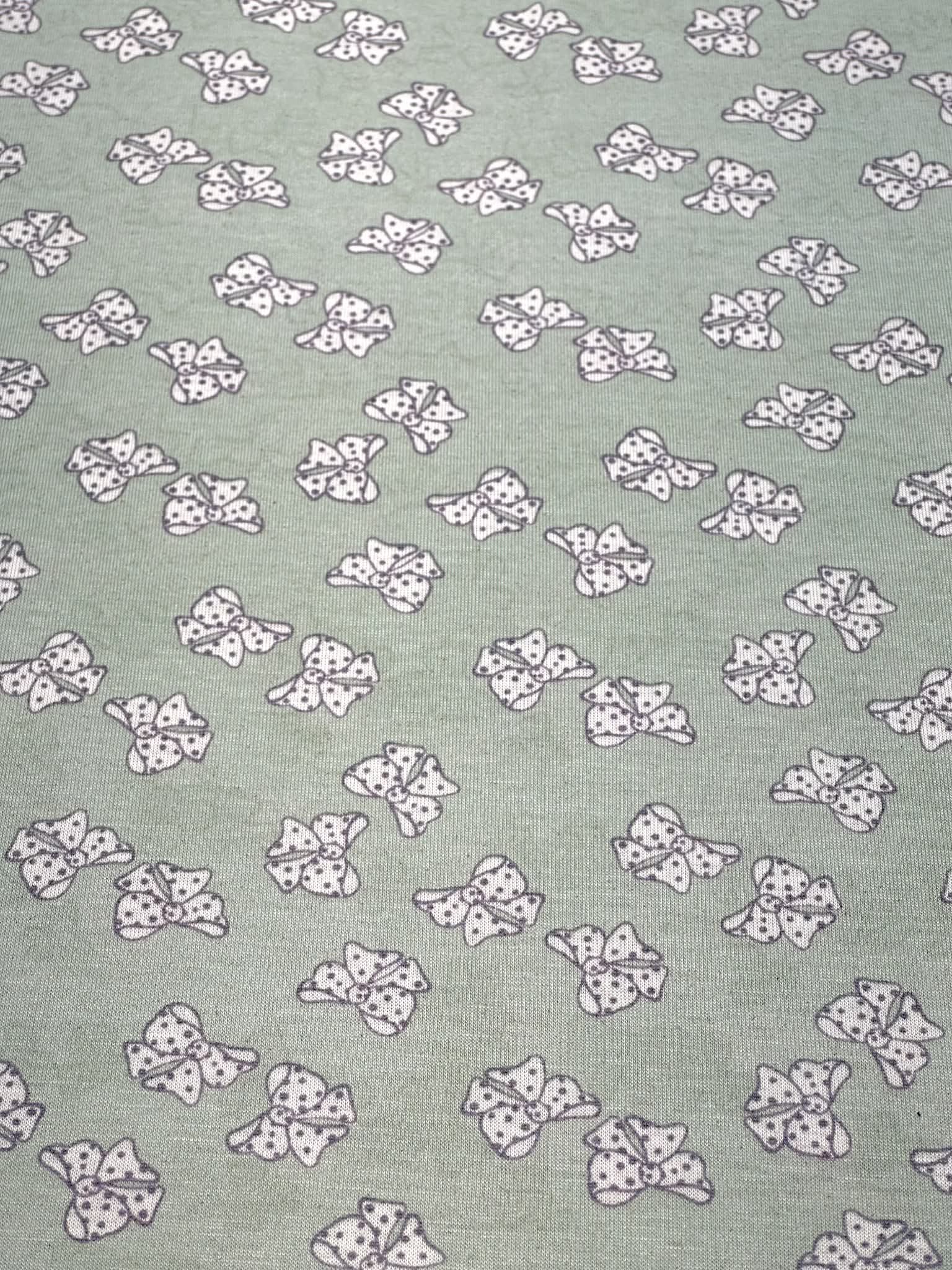 (KNIT) OFF WHITE POLKA DOT BOWS ON LIGHT SAGE