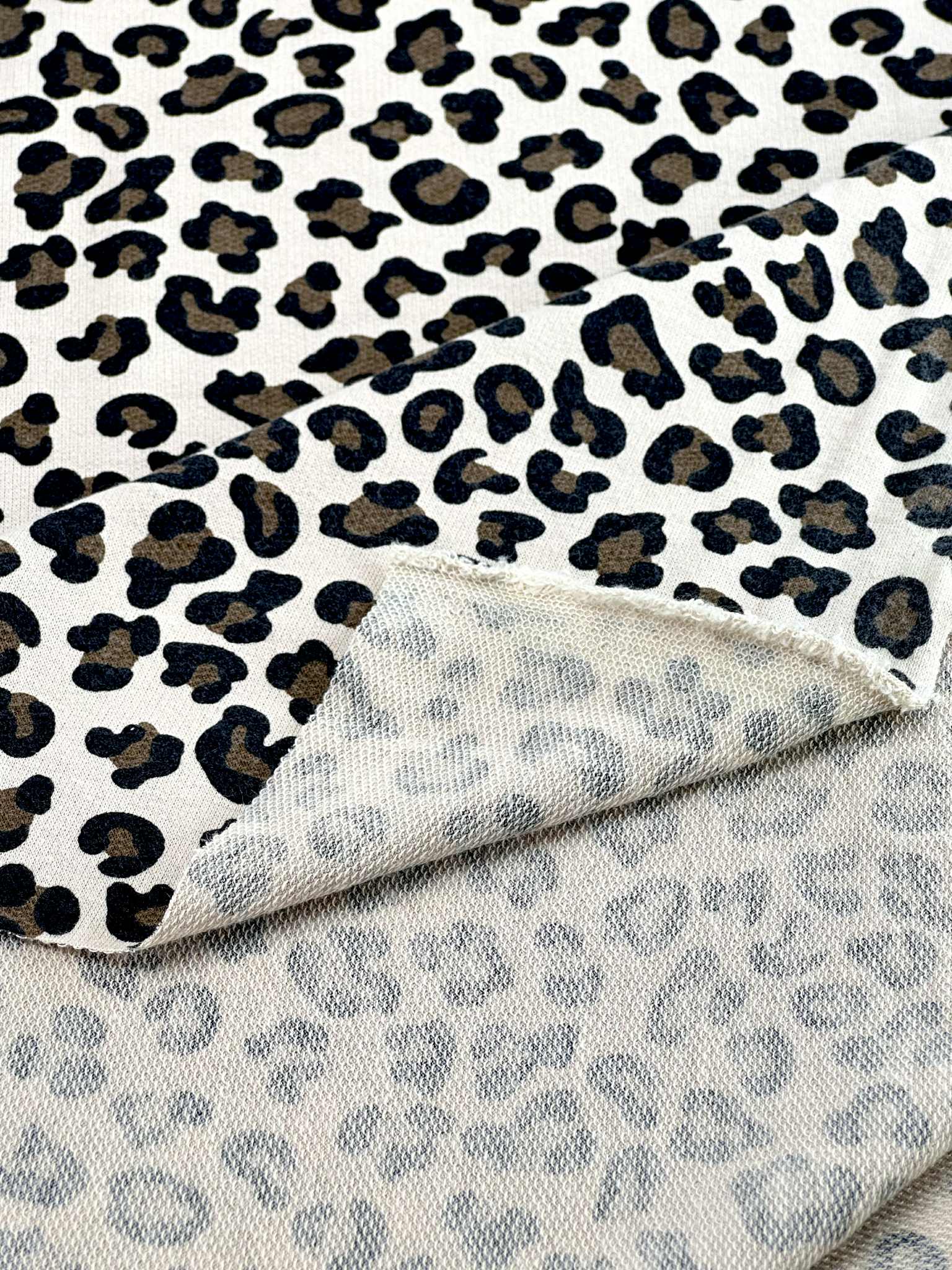 (FRENCH TERRY) BROWN AND BLACK CHEETAH ON TAUPE