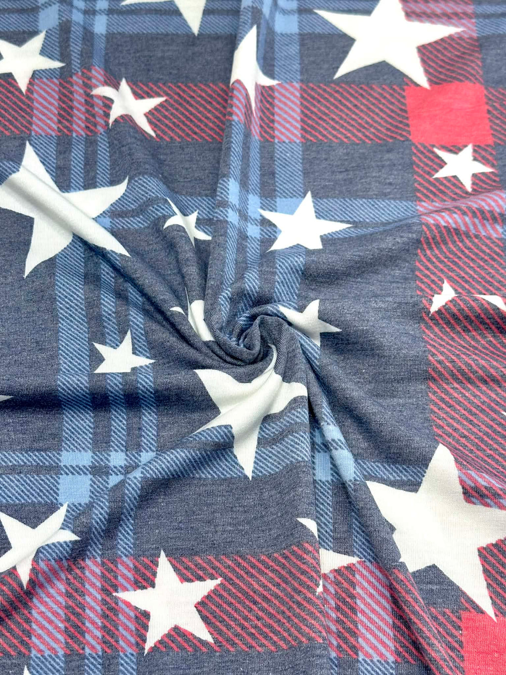 (KNIT) OFF WHITE STARS ON NAVY AND RED PLAID