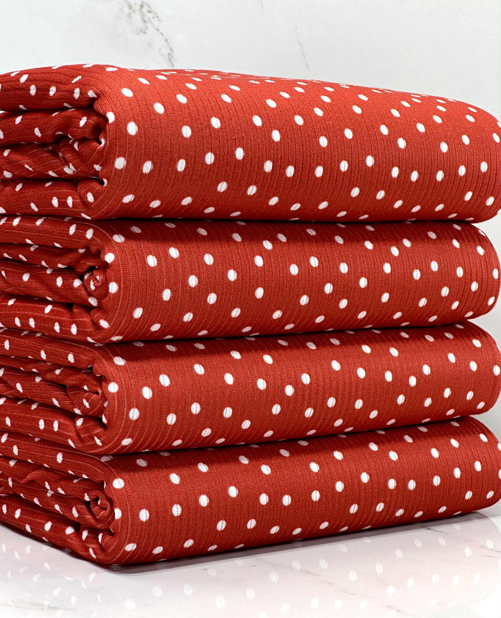 (4X2 RIB) TINY OFF WHITE POLKA DOTS ON RED
