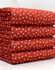 (4X2 RIB) TINY OFF WHITE POLKA DOTS ON RED