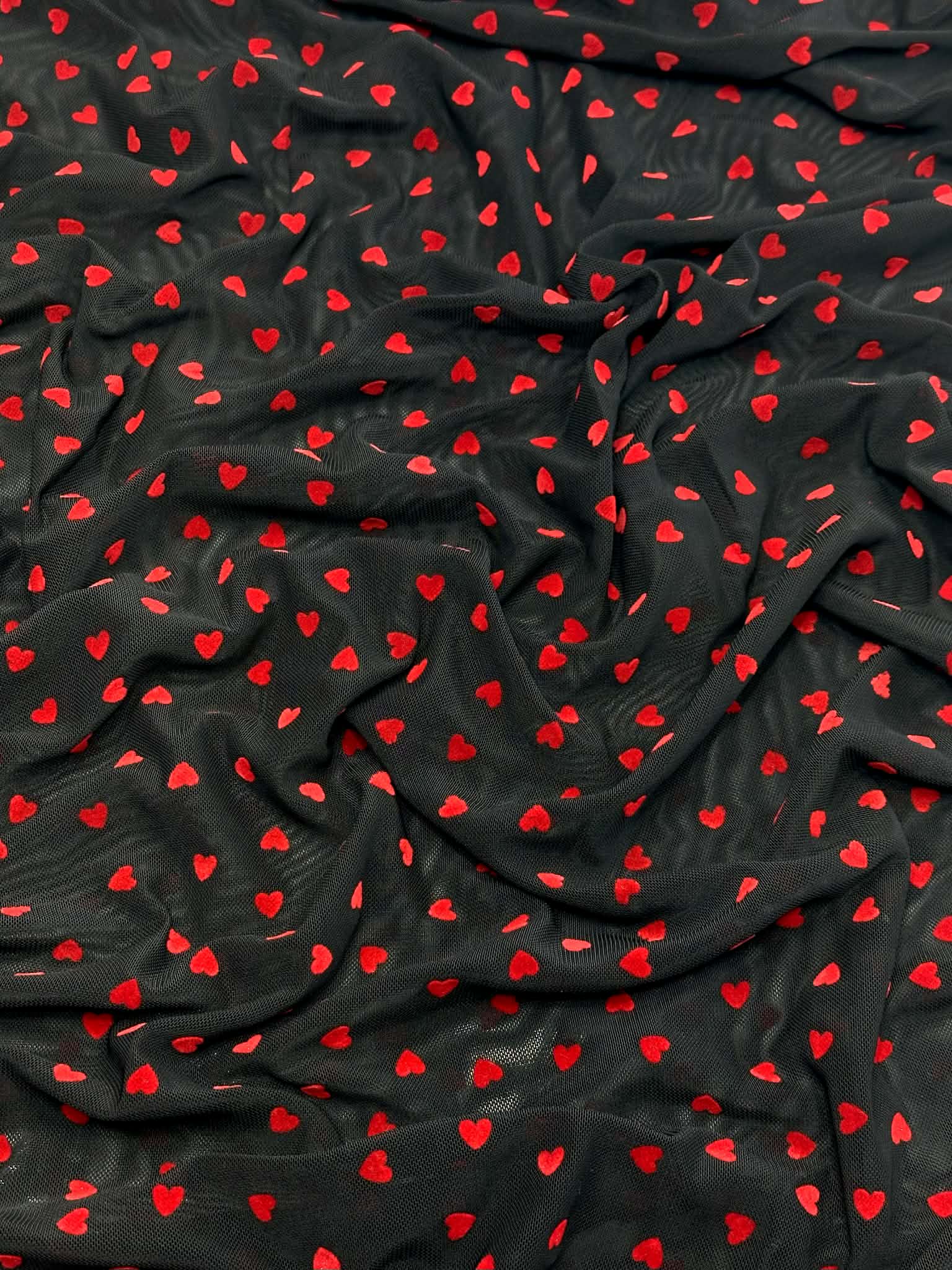 (MESH) TINY RED FLOCK HEARTS ON BLACK