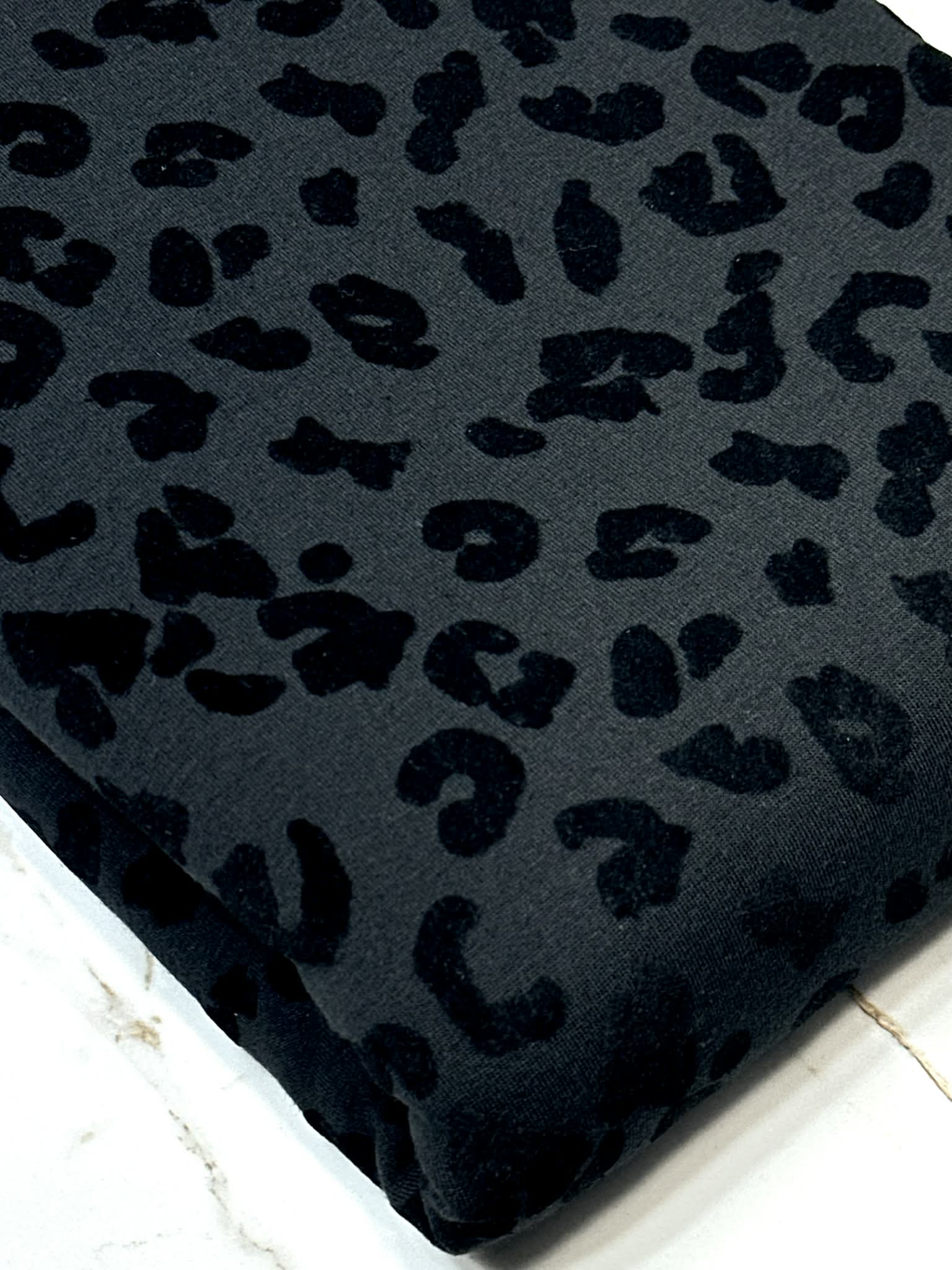 (FRENCH TERRY BRUSHED) BLACK FLOCK LEOPARD ON BLACK