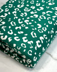(DBP) TINY WHITE LEOPARD ON HUNTER GREEN