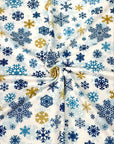 (DBP) BLUE AND GOLD SNOWFLAKES ON OFF WHITE