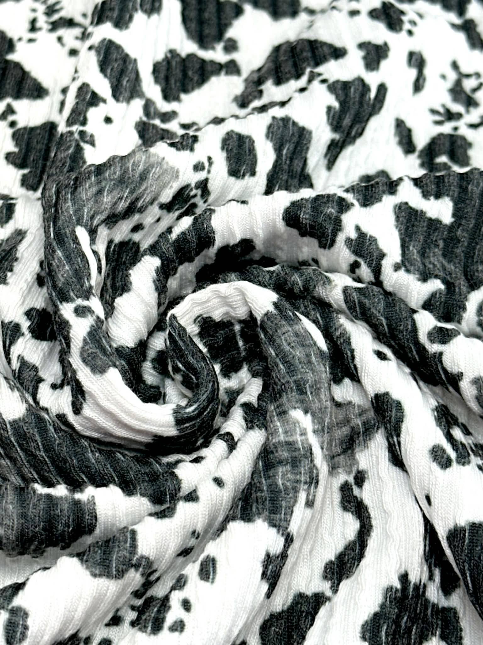 (URBAN RIB) SMALL BLACK COW FUR PRINT ON OFF WHITE