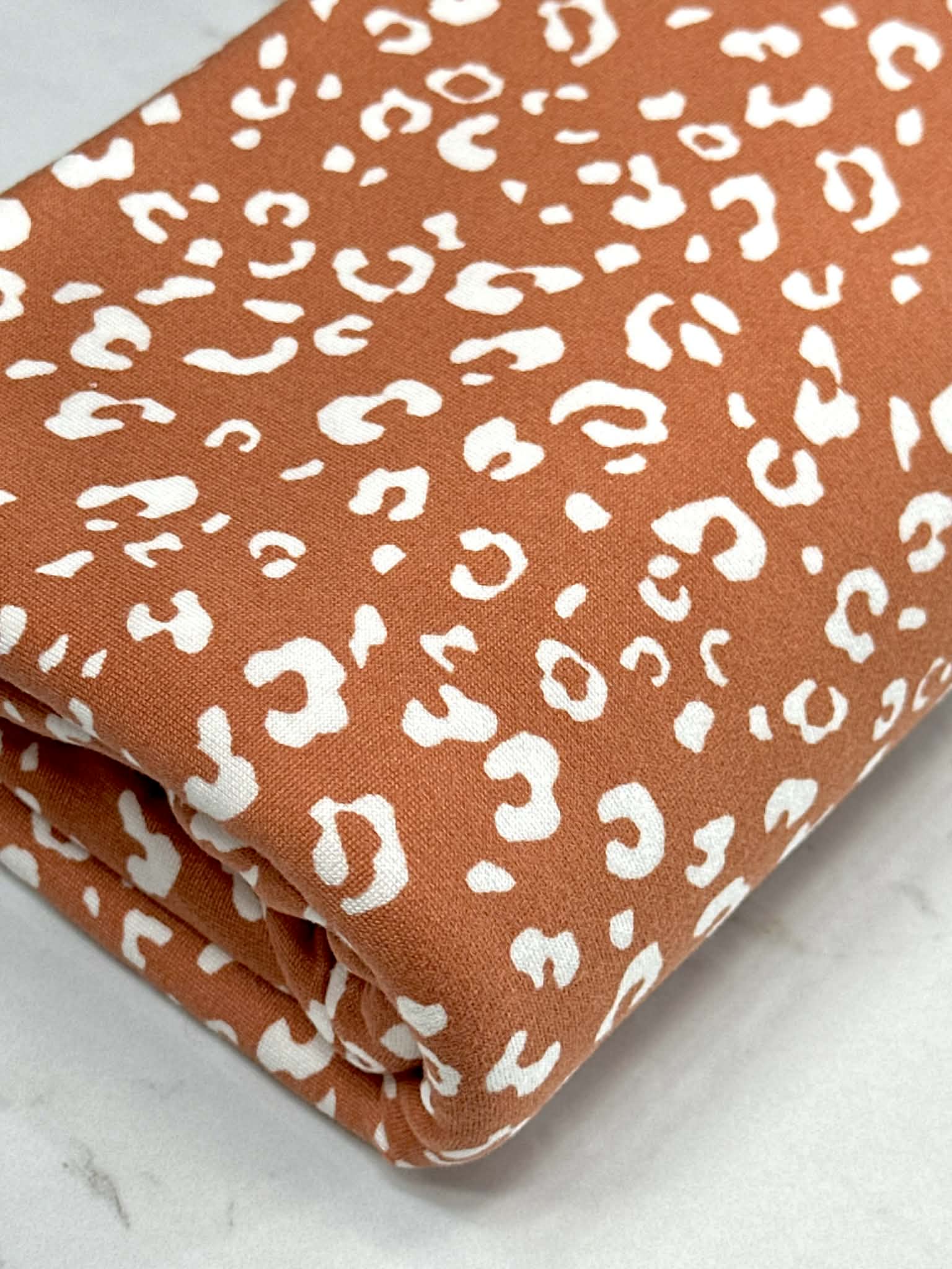 (DBP) TINY WHITE LEOPARD ON VINTAGE ORANGE