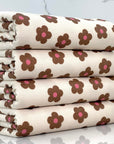 (FRENCH TERRY) SMALL PINK AND BROWN FLOWERS ON LIGHT CREAM