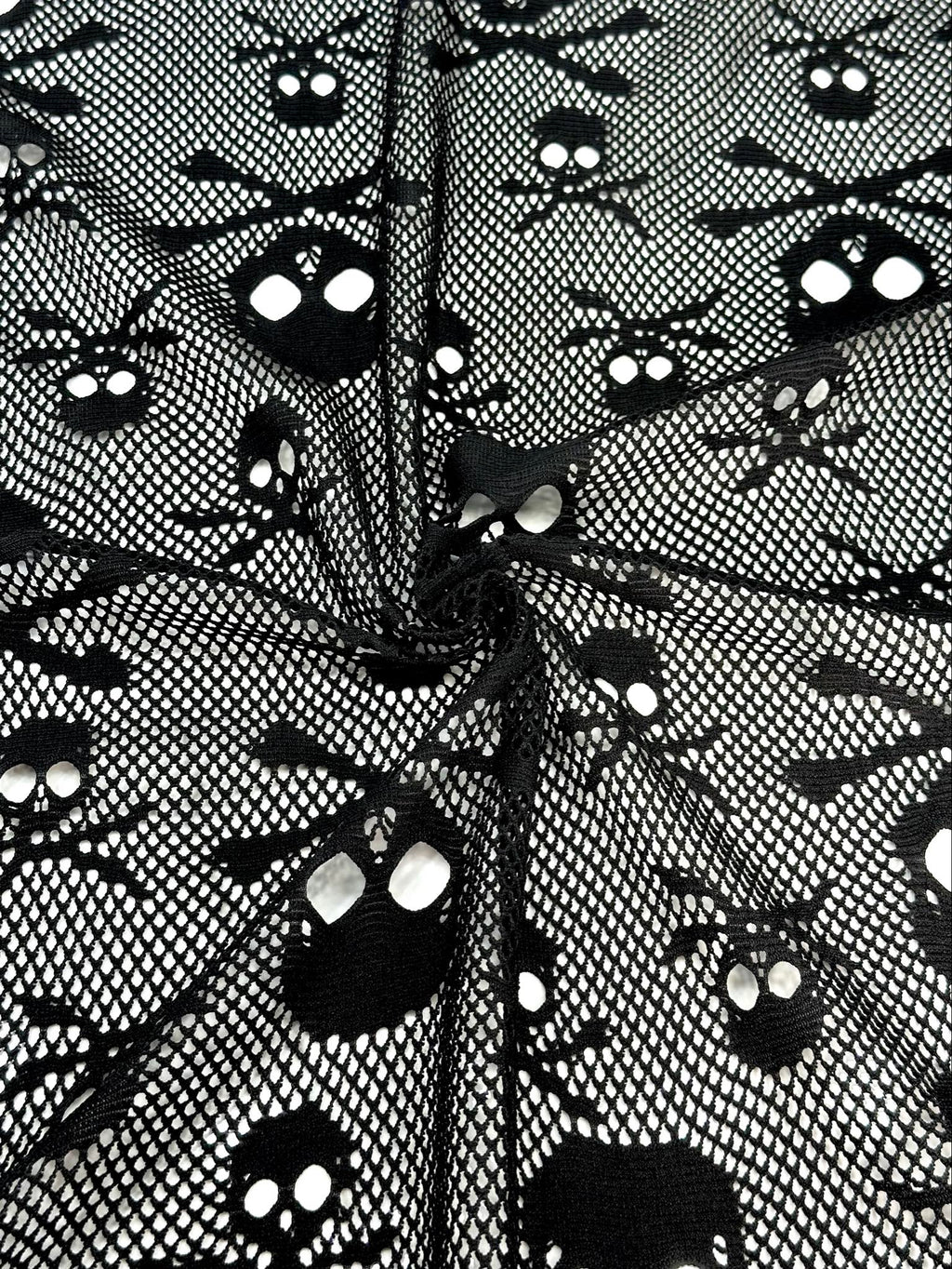(JERSEY) SMALL AND MEDIUM BLACK SKULLS ON BLACK