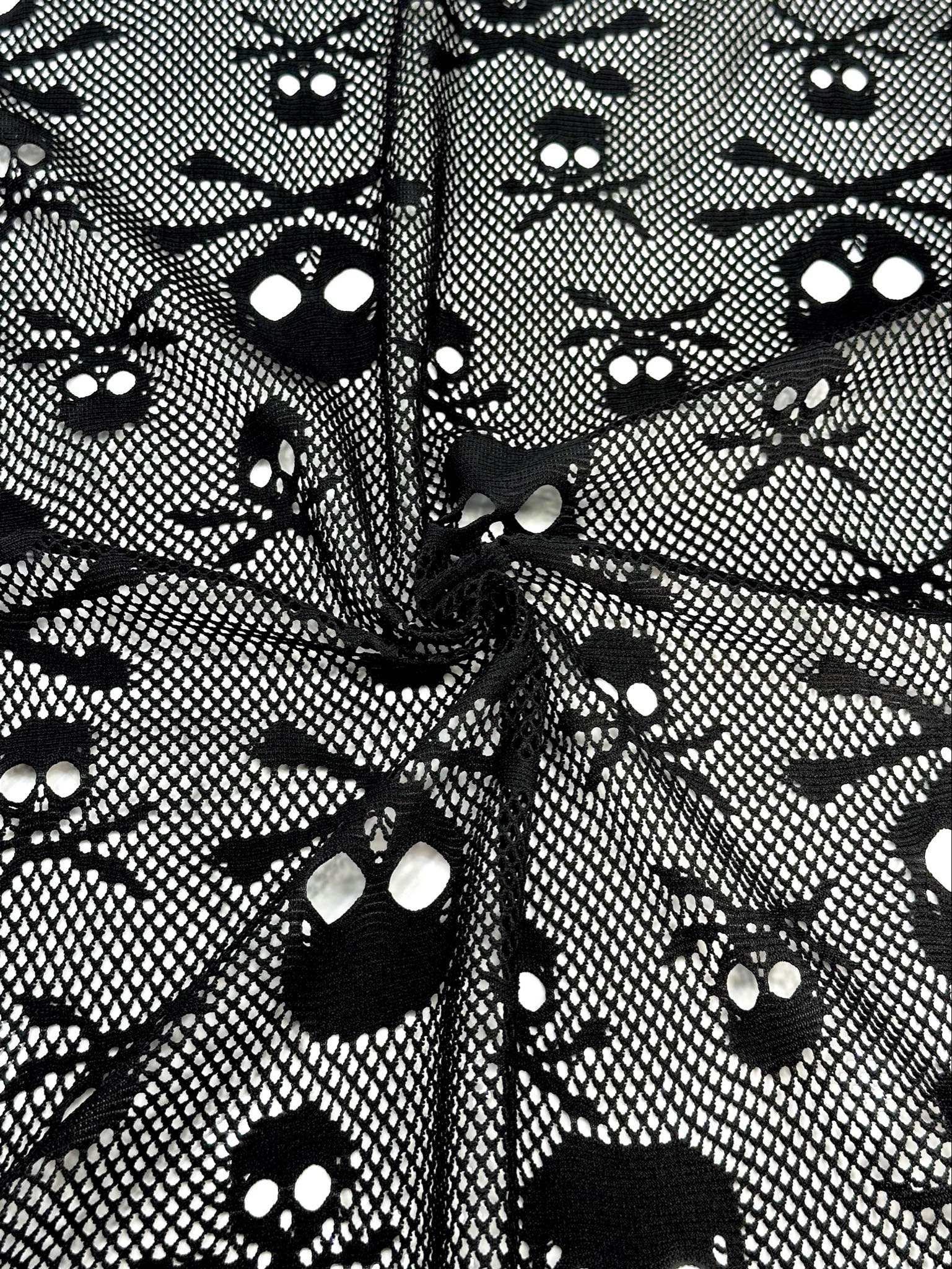 (JERSEY) SMALL AND MEDIUM BLACK SKULLS ON BLACK
