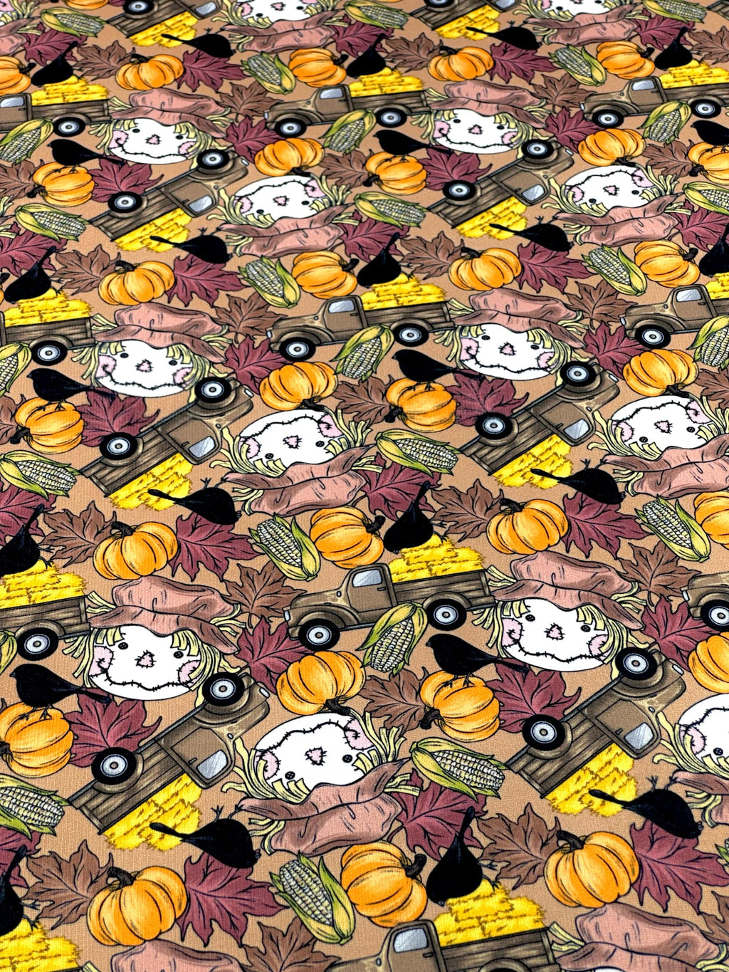 (SWEATER KNIT/OAKLEY) SMALL HAY TRUCKS, SCARECROWS & BLACK CROWS ON COFFEE (1)