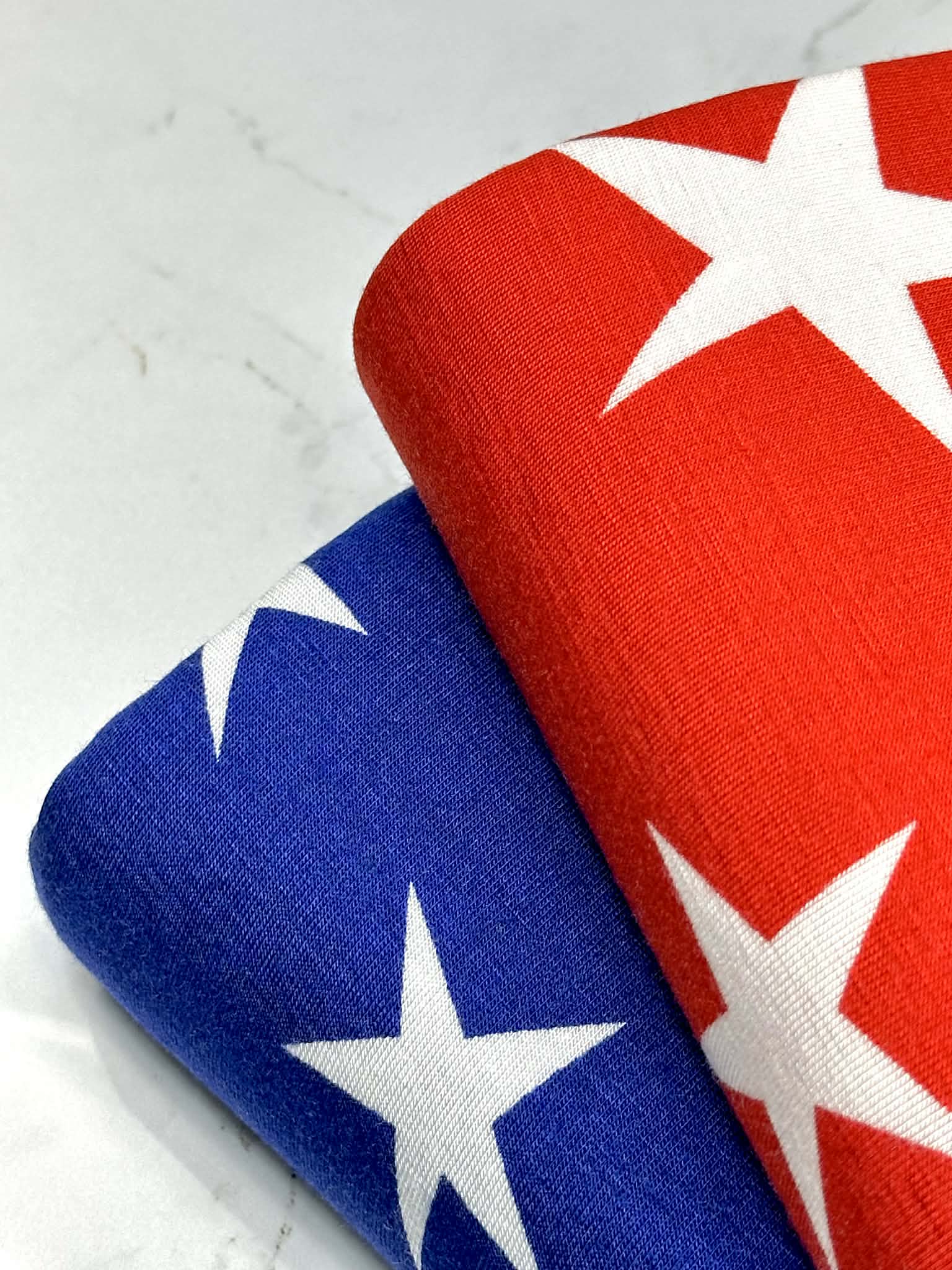(RAYON MODAL) OFF WHITE STARS ON ROYAL