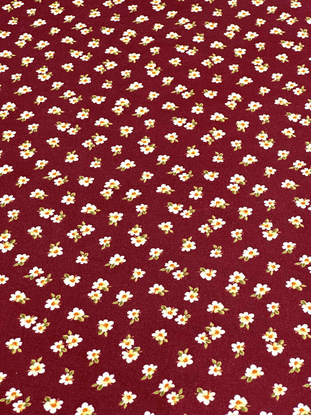 (DBP) TINY OFF WHITE FLOWERS ON WINE(1)