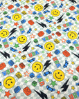 (FRENCH TERRY) YELLOW HAPPY FACES AND SKATEBOARDS ON CHECKERED WAVE