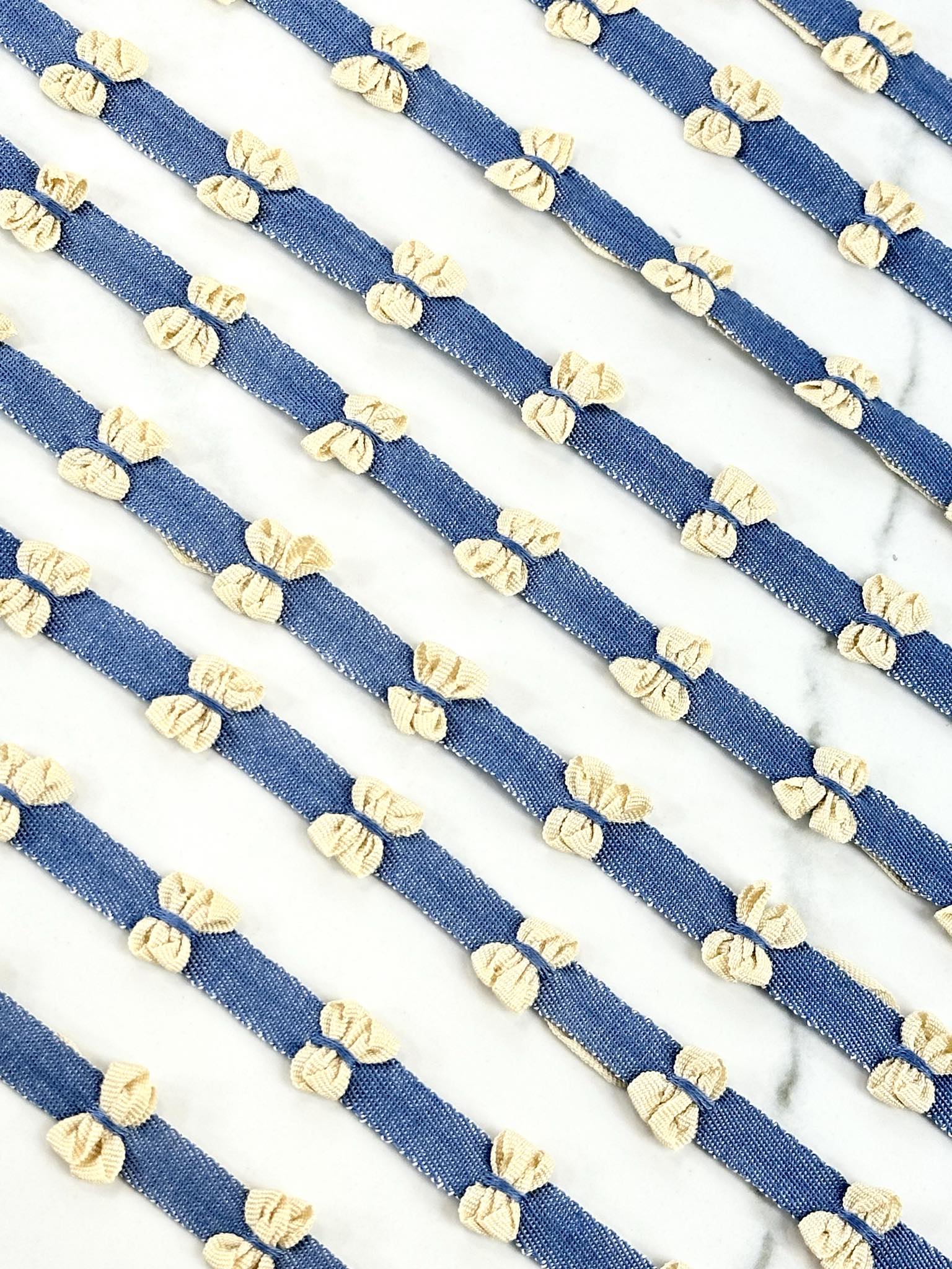 (TRIM) CREAM BOWS ON DENIM STRIP