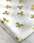 (WOVEN) GOLD BOWS ON OFF WHITE