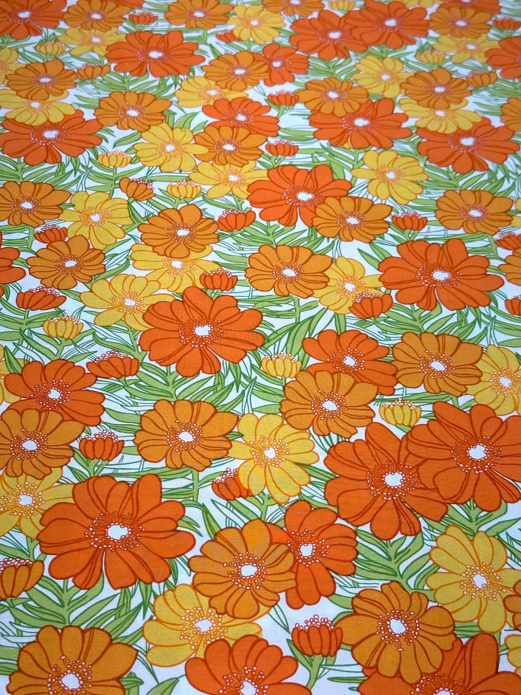(WOVEN) ORANGE AND TANGERINE FLOWERS ON OFF WHITE