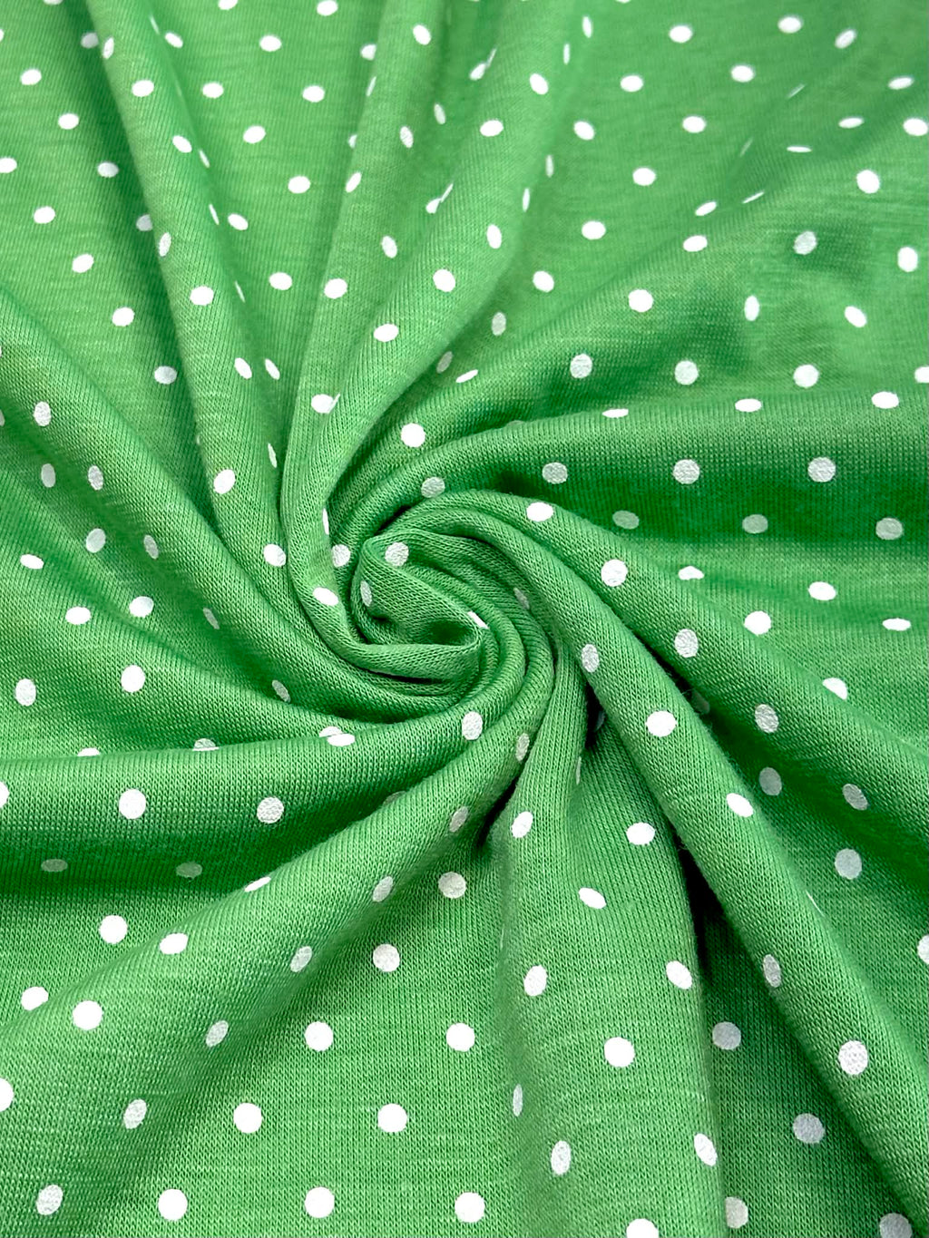 (KNIT) TINY OFF WHITE POLKA DOTS ON GREEN