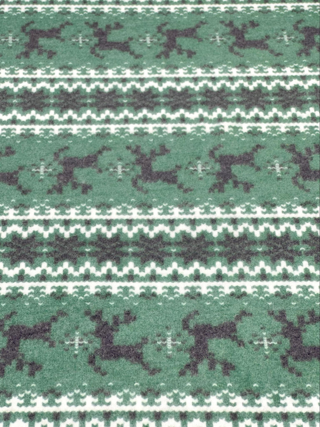 (BRUSHED SWEATER KNIT) BLACK REINDEERS ON DARK GREEN