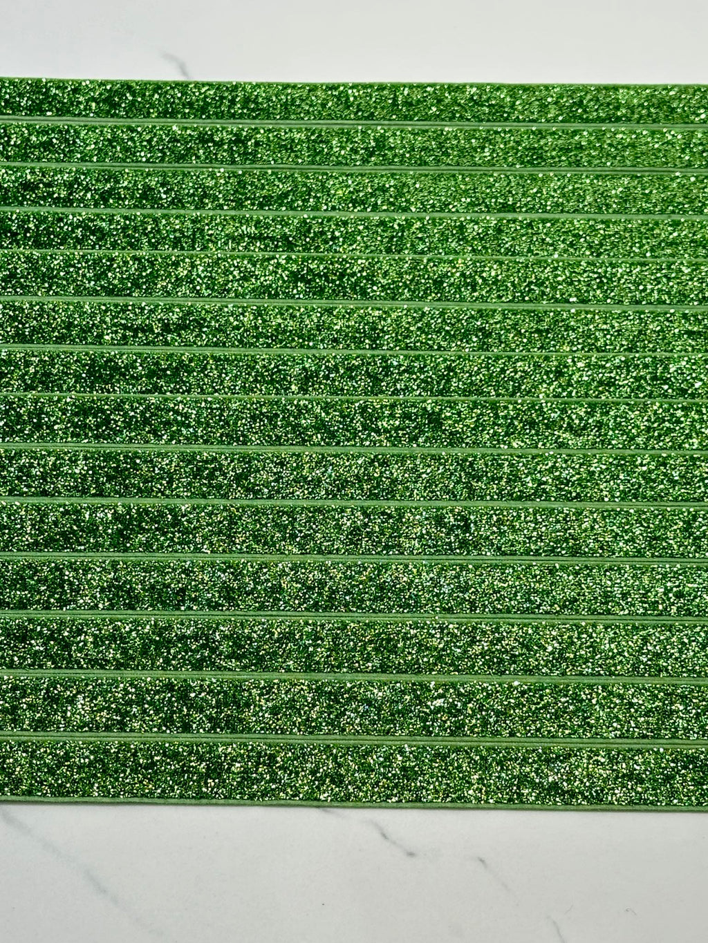 (TRIM) 5/8 ELASTIC GREEN SHIMMER
