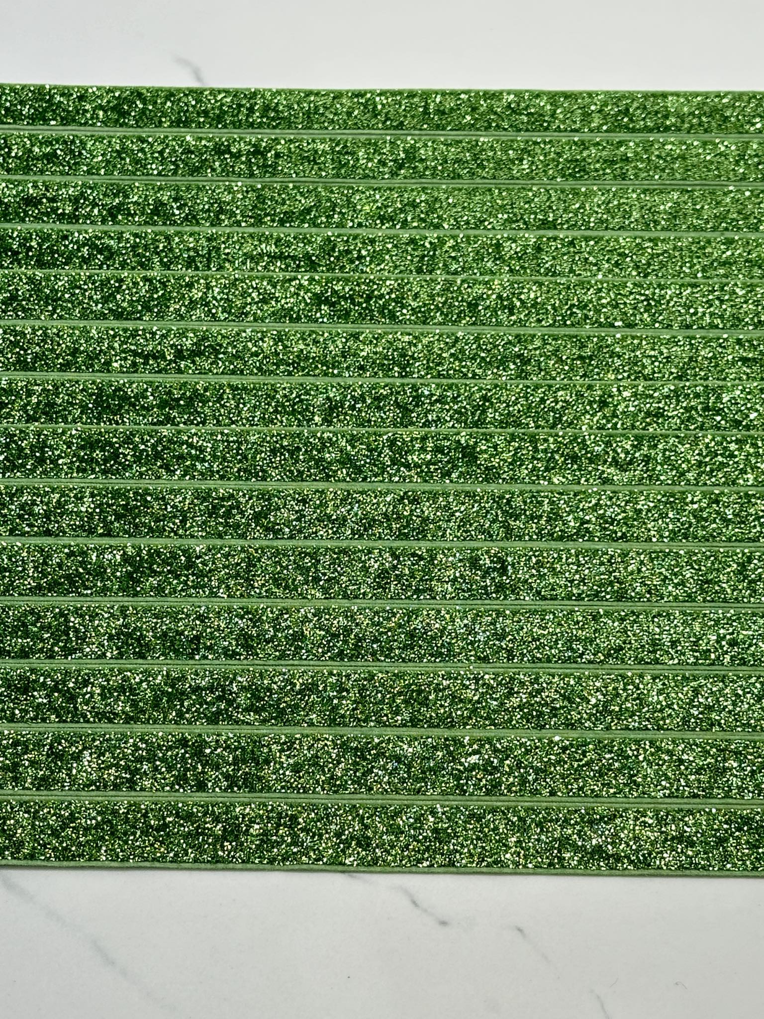 (TRIM) 5/8 ELASTIC GREEN SHIMMER