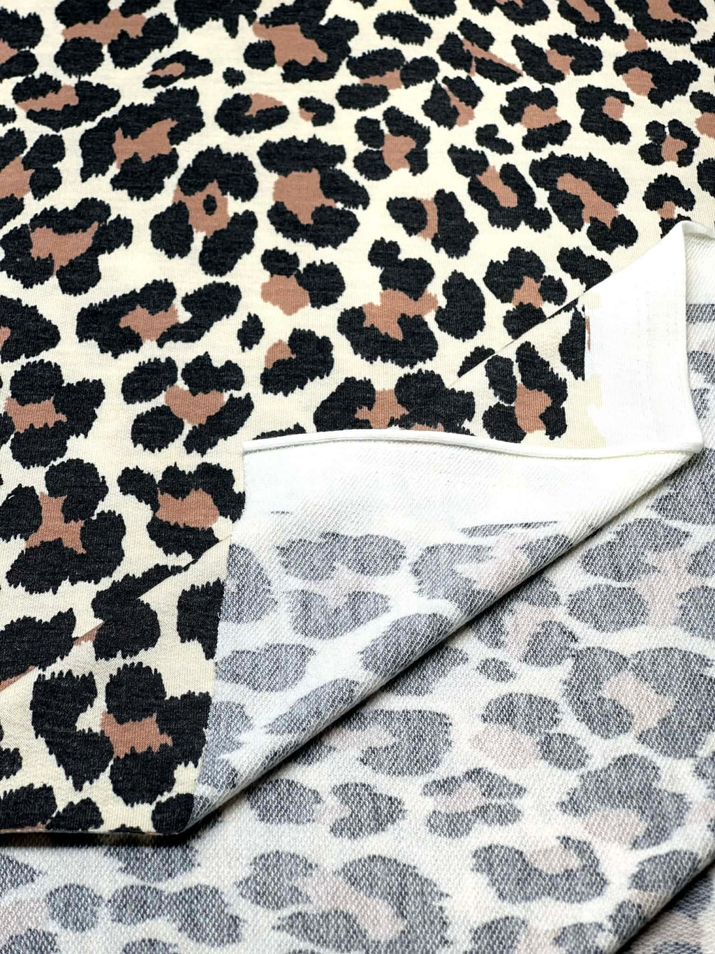 (FRENCH TERRY) BROWN AND BLACK CHEETAH ON CREAM