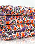 (DBP) PURPLE AND ORANGE FLOWERS ON OFF WHITE