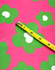(WOVEN) GREEN FLOWERS ON FUCHSIA