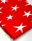 (RAYON  MODAL) OFF WHITE STARS ON RED