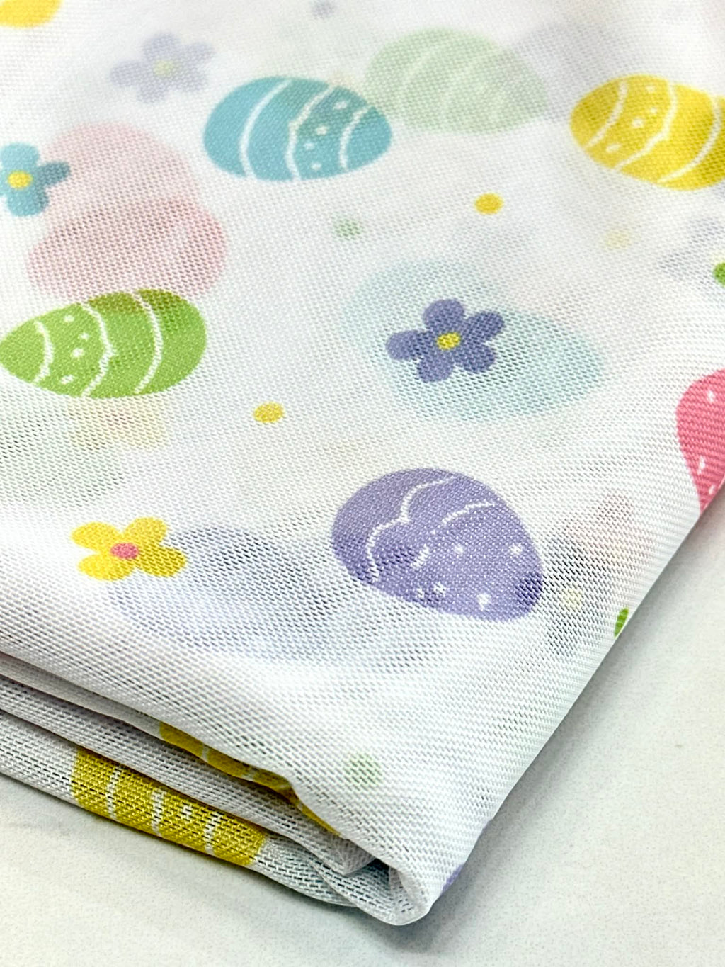 (MESH) PASTEL COLOR EGGS AND TINY FLOWERS ON OFF WHITE