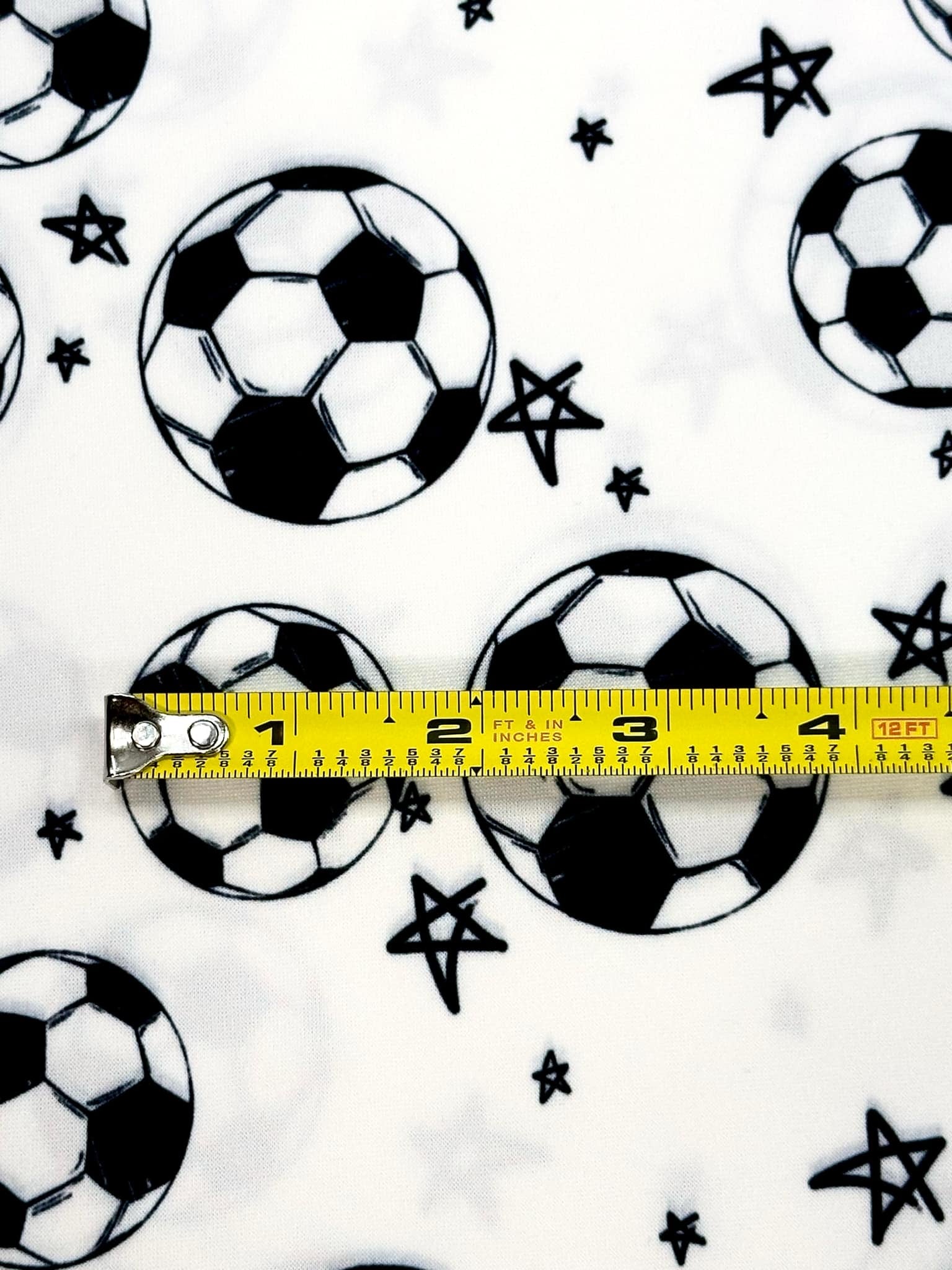 (DBP) SOCCER BALLS AND STARS ON OFF WHITE