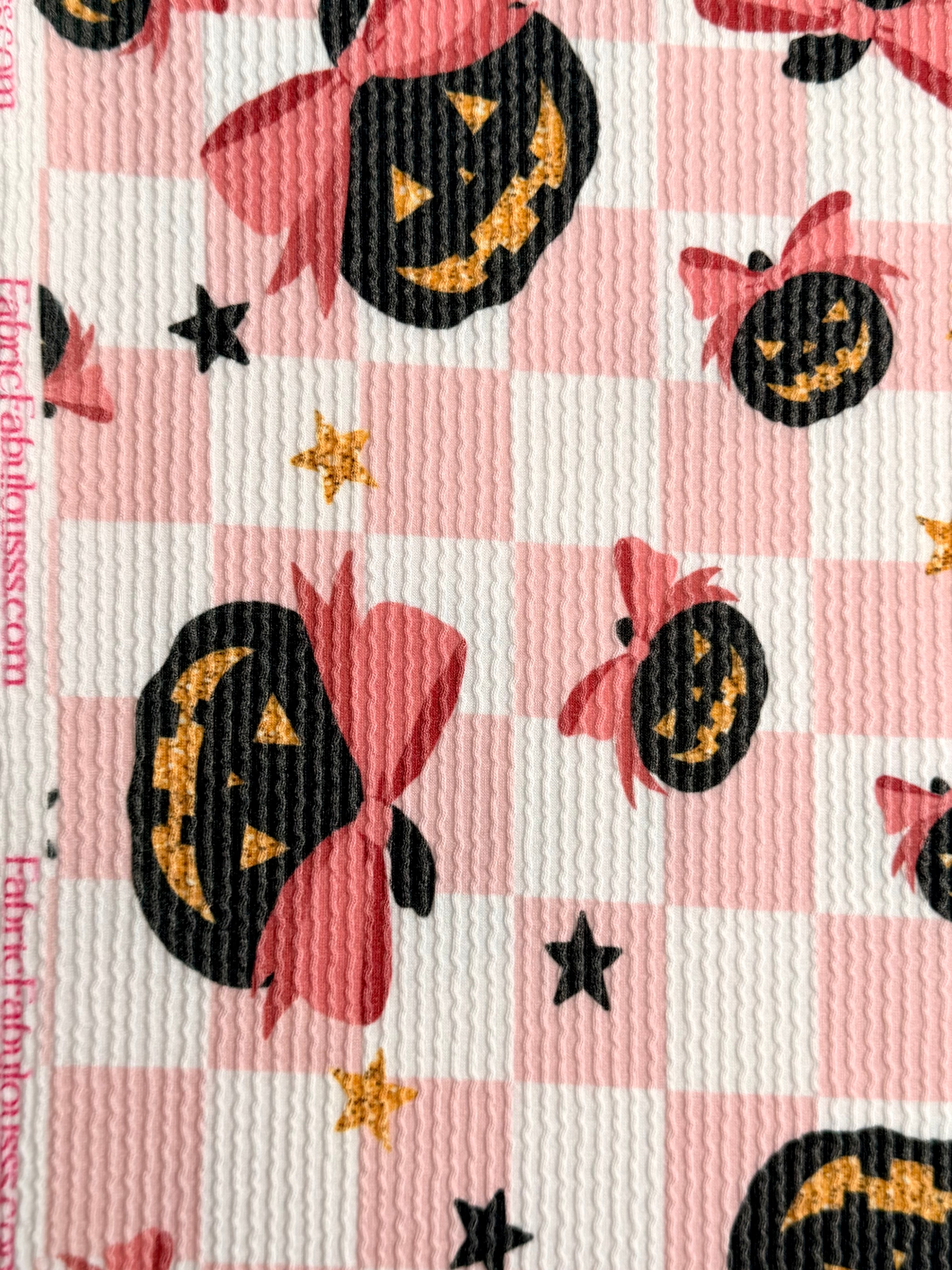 (URBAN RIB) BLACK PUMPKINS WITH BOWS AND STARS ON LIGHT PINK CHECKERED