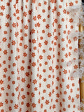 (URBAN RIB) TINY BURNT ORANGE FLOWERS ON CREAM
