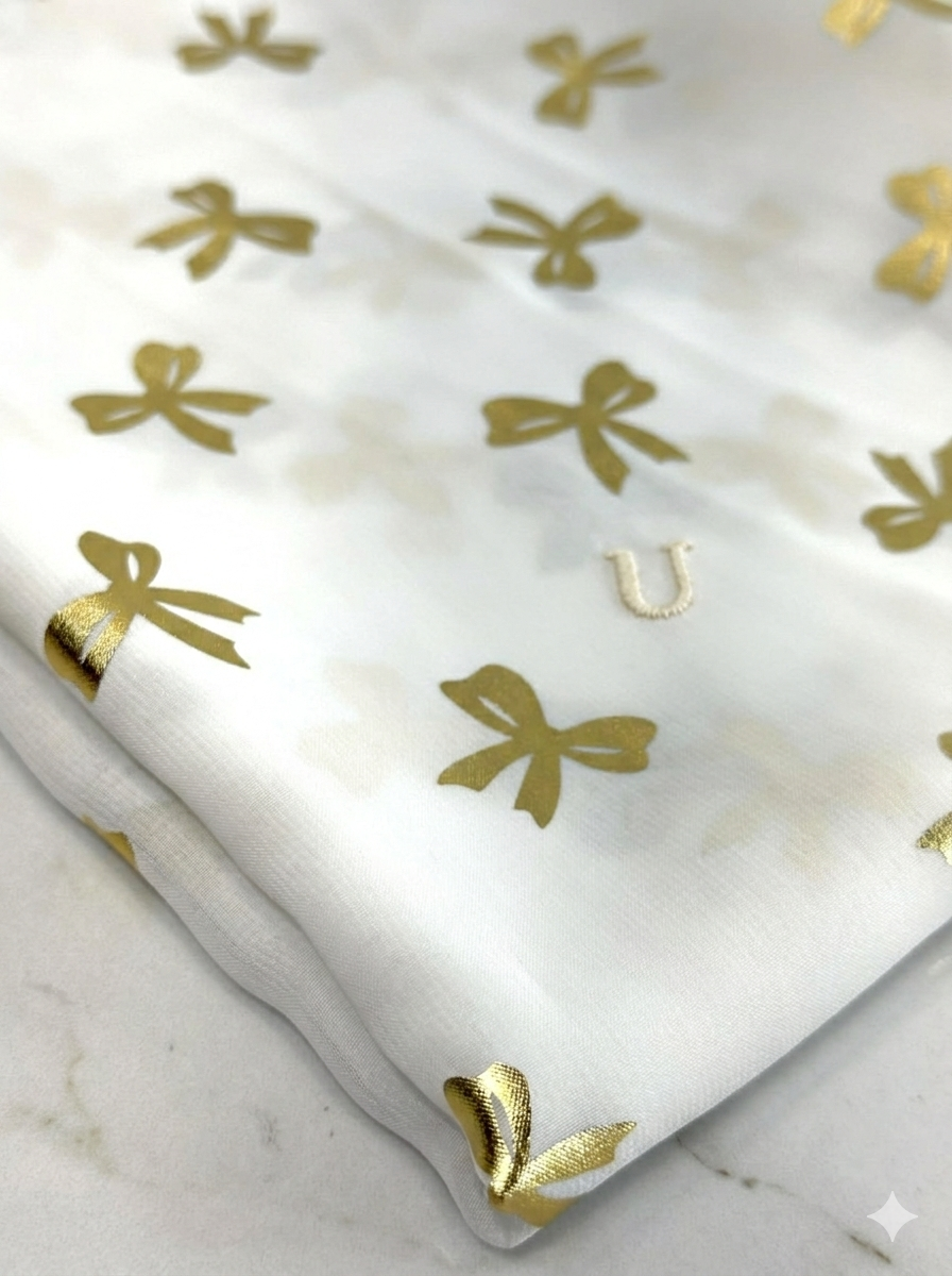 (WOVEN) GOLD BOWS ON OFF WHITE