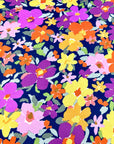 (SWEATER KNIT) PURPLE, ORANGE, YELLOW AND PINK FLOWERS ON NAVY